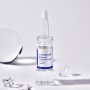 Transparente Ampulle der LACTOREGEN Ampoule mit 6 ml Inhalt, auf weißem Hintergrund fotografiert. Produkt für Anti-Falten- und Aufhellungsbehandlungen.