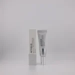 ACTIVE-31 Revitalizing Eye Cream in Tube mit silbernem Applikator neben passender Produktverpackung.